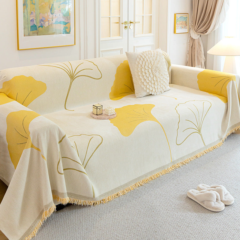 Couverture de canapé à franges motif damier – Élégance, confort et design intemporel pour votre intérieur – par Camado