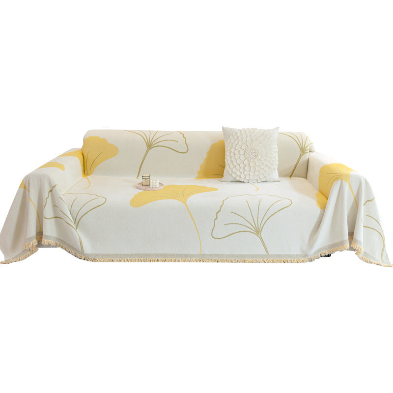 Couverture de canapé à franges motif damier – Élégance, confort et design intemporel pour votre intérieur – par Camado